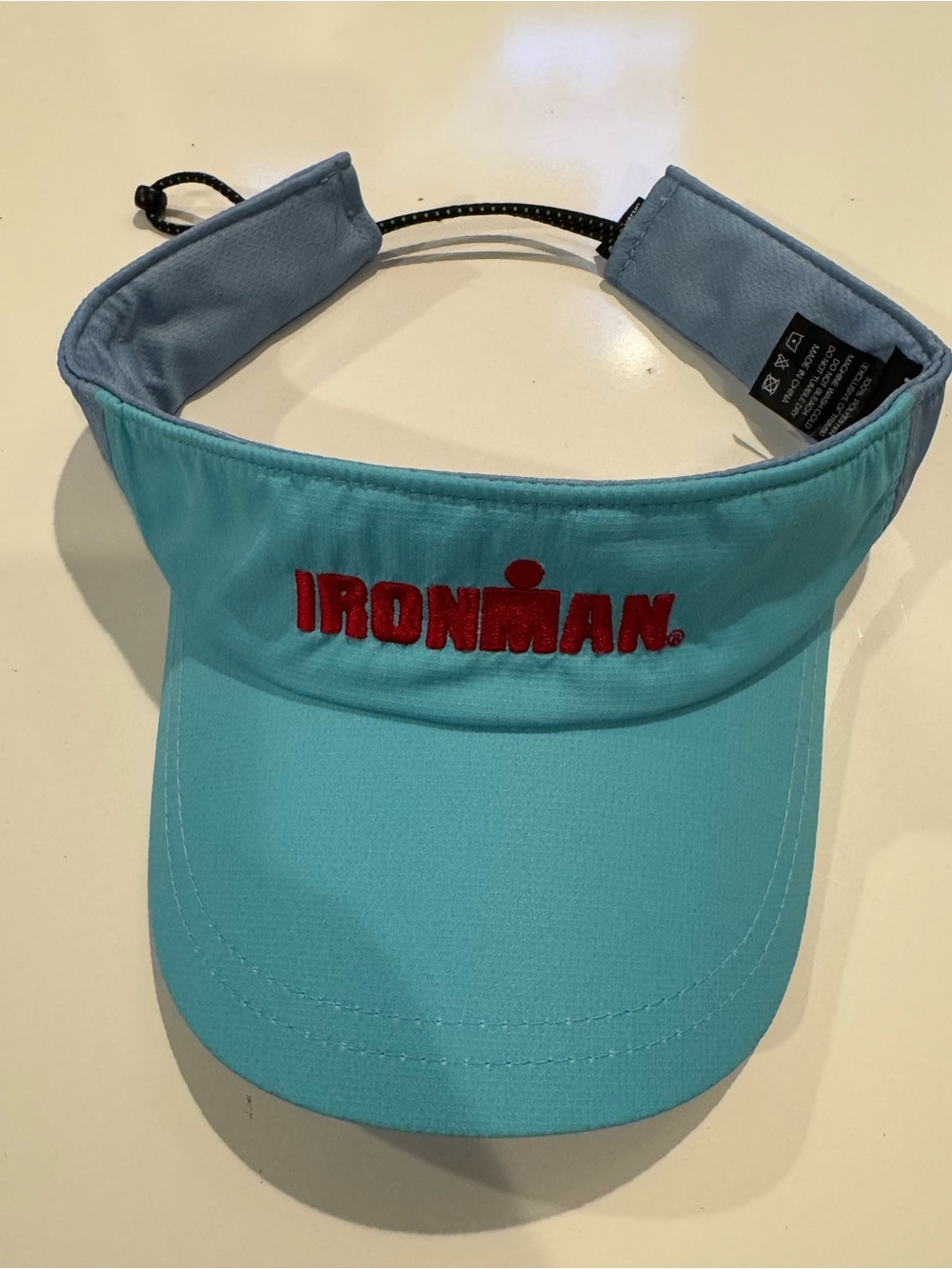 IRONMAN Performance Visor Hat FRACTEL Teal Blue Moisture Wicking Bungee Closure